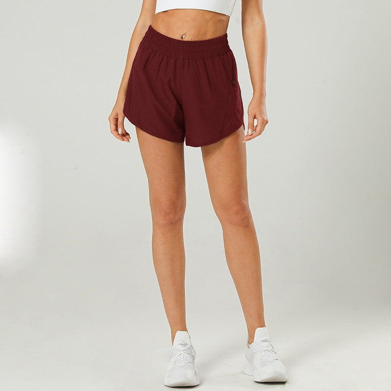 a woman wearing brown color wrath shorts